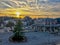 The main square of the Belgian town Spa, with a large christmas tree during sunrise. Spa is famous for its mineral springs and