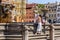 Main square in Ceske Budejovice, woman and chil near fountain. Czech republic, Europa