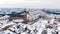 Main Square in Krakow surrounded by historic townhouses (kamienice) and churches