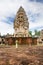 Main tower and courtyard of ancient Khmer temple built of red sandstone and laterite and dedicated to the Hindu god Shiva