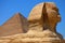 Main view of the Great Sphinx of Giza with Pyramid backwards, Egypt