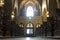 Main window, organs, entrance and wooden benches of the Church of St Peter and St Paul