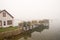 Maine fishing wharf in fog