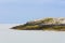 Maine rocky coast with puffins on rocks