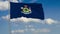 Maine State flag in wind against cloudy sky