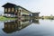 Maing Thauk, Myanmar - April 2019: traditional Burmese floating house on water in Inle lake