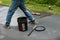 Maintaining an asphalt driveway with blacktop sealer