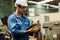 Maintenance engineer industrial plant with a tablet in hand