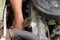 maintenance of an old automobile car, replacements of some car components like spark plug, maintenance service for radiator,