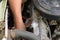 maintenance of an old automobile car, replacements of some car components like spark plug, maintenance service for radiator,