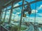 A maintenance workers cleaning windows on high rise