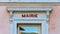 `Mairie` sign ie `Town hall` in French written in red, over the door of a french town hall