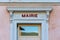 `Mairie` sign ie `Town hall` in French written in red, over the door of a french town hall