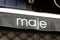 Maje logo brand boutique and text sign clothes facade store French fashion shop