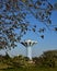 Majestic blue and white water tower blends into the blue sky of northern France