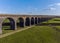 The majestic brick arches of the Harringworth Viaduct span the Welland Valley floodplain