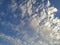 Majestic bright blue sky with fluffy clouds in the afternoon