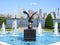 Majestic Bronze Eagle in a Water Fountain Against a New York City Skyline