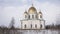 Majestic building of Trinity Cathedral with golden domes in Russian town of Morshansk on winter day