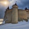 A majestic castle on a hill with a cloudy sky in the background1, Generative AI