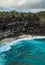Majestic cliffs surround a serene turquoise bay at Broken Beach, Nusa Penida