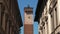 Majestic clock tower between eclectic palaces in Pavia, Italy