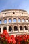 Majestic Colosseum in Rome against blue sky, Italy