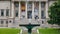 The majestic columns of the palace and fountain close-up in the city of Seoul