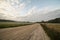 Majestic country landscape under morning sky with clouds.