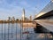 Majestic cruise ship floating along the Danube River, passing the iconic DC Tower in Vienna