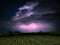 Majestic Cumulonimbus storm cloud is lit by lightning