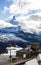 Majestic Dreamy View of snowy Gornergrat station and the iconic Matterhorn Peak shrouded with clouds, Zermatt, Switzerland, Europe