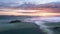 Majestic drone landscape image of sea of fog rolling across South Downs English countryside during Spring sunrise