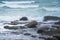 Majestic Evening Seascape: Dramatic Waves Collide with Island Rocks in Eastern Thailand