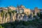 Majestic full view at the Cuenca Hanging Houses, Casas Colgadas, and San Pedro church tower, iconic architecture on Cuenca city