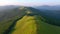 Majestic green hills from a bird`s eye view. Filmed in UHD 4k video