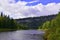 The majestic gypsum stone massif Usvinskie Stolby on the right bank of the Usva River