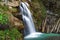 Majestic Hidden Waterfall in Natural Landscape