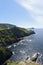 Majestic Irish Cliffs: Illuminated Beauty of Azure Sky, Pristine Ocean