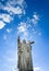 Majestic Jesus Christ sculpture over little french village