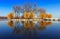 Majestic landscape. man-made island in the middle of the lake in the city is reflected in water.