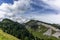 The majestic landscape of the steep Alpstein mountain range around the Aescher cliff in Appenzell, Switzerland