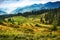 Majestic landscape of summer mountains. A view of the misty slopes of the mountains in the distance.