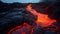 Majestic Lava Stream Amidst a Landscape of Black Molten Minerals