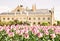 Majestic Lednice castle with flowering tulips, yellow filter