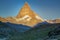 Majestic Matterhorn with golden light at sunrise, Swiss Alps, Zermatt