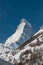 Majestic Matterhorn mountain in front of a blue sky