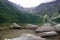 Majestic mountain lake with clear blue-green water. spectacular views of mountains. View of mountain lake Morskie Oko, Tatra