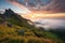 majestic mountain sunrise with a view of the rolling clouds