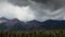 Majestic mountains, moving clouds and sunshine. Time lapse. East Sayan, Siberia